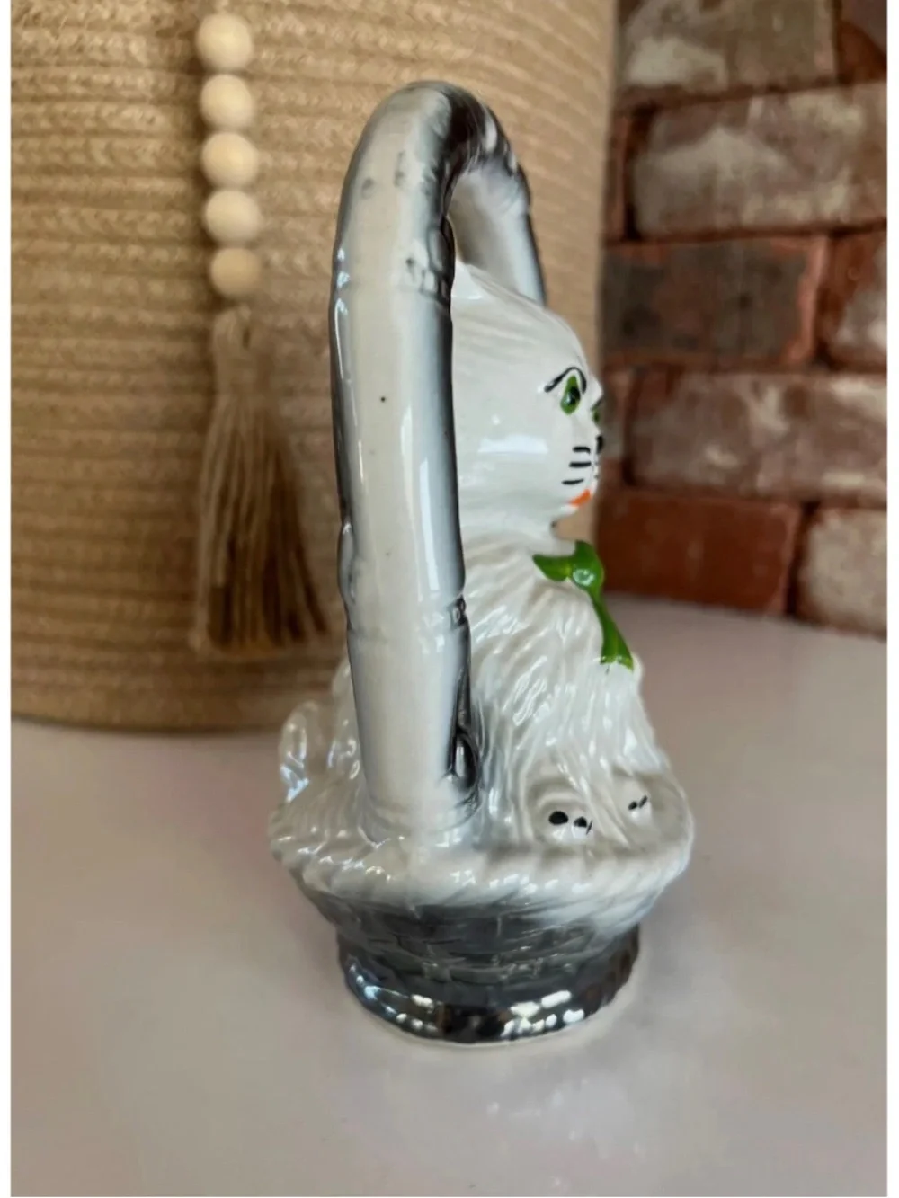 Vintage 1950’s Japan White Ceramic Cat Figurine with Green Bow and Silver Handle
